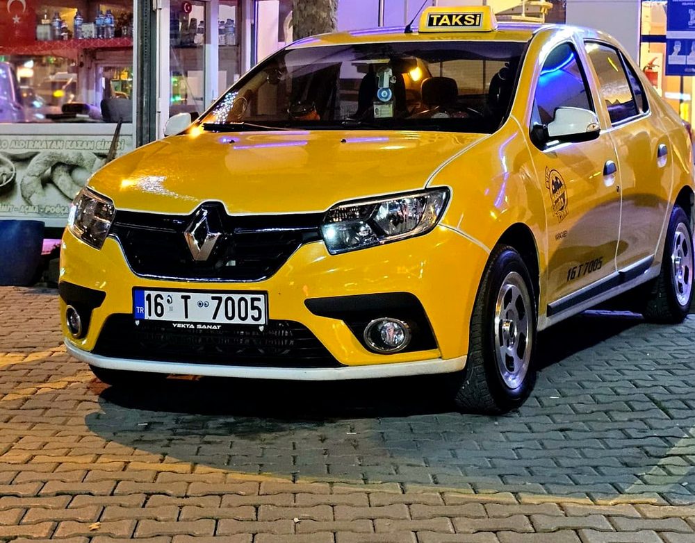 Karacabey Taksi sarı Renault Symbol taksi — Karacabey merkez